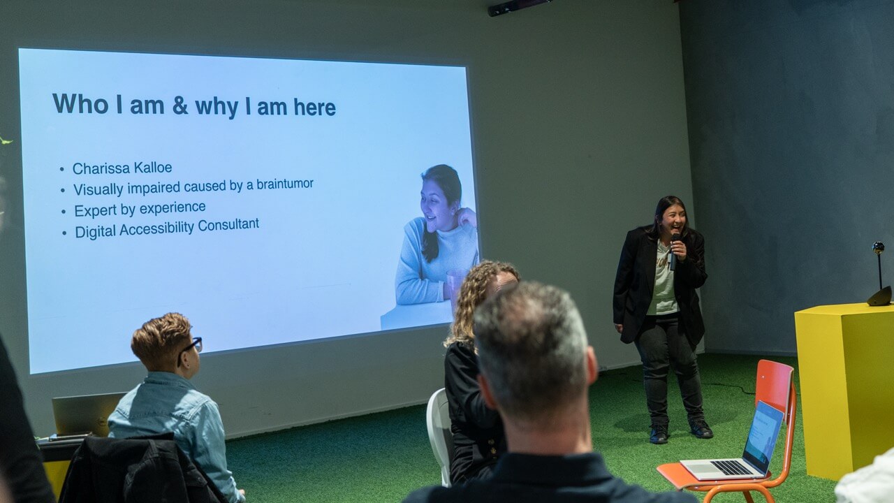 Charisse Kalloe giving presentation