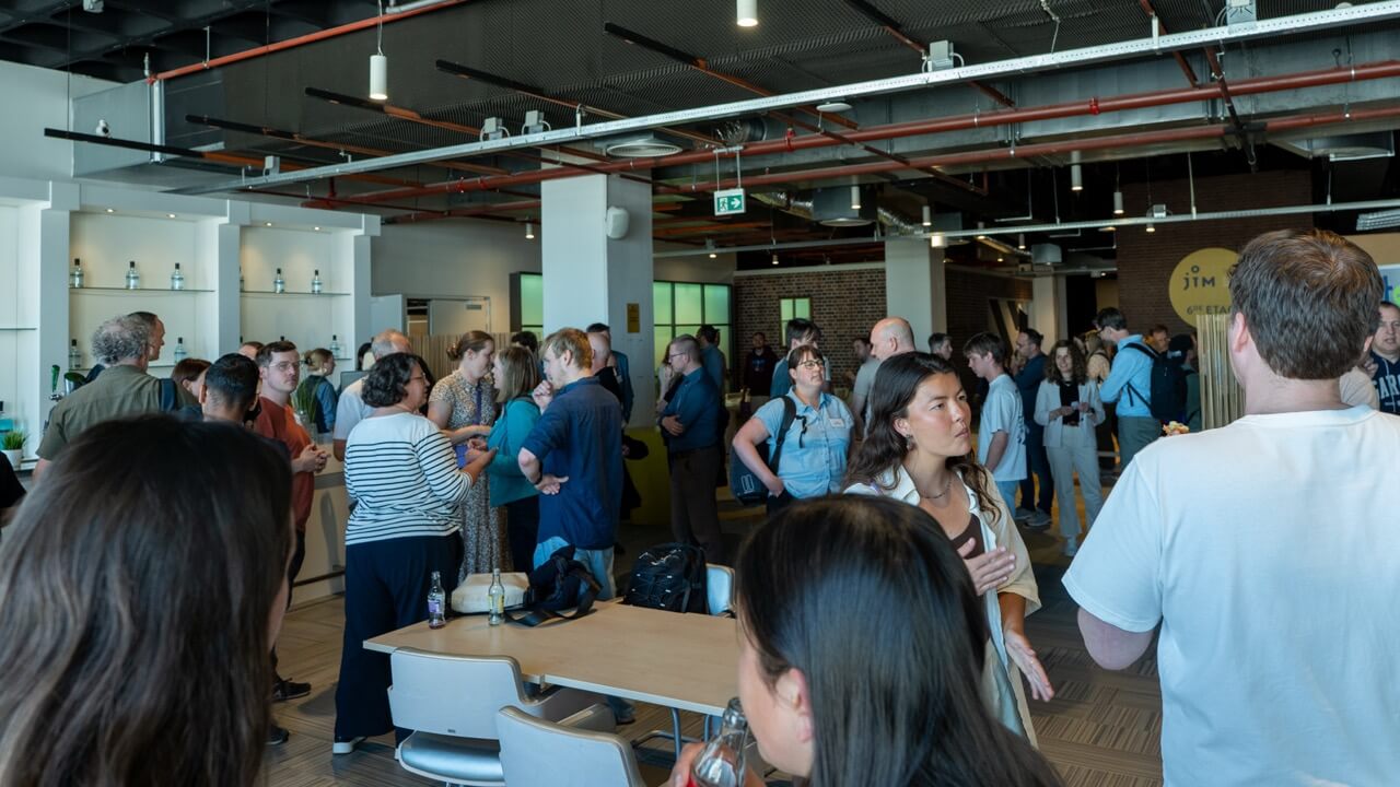 Full room of people during the networking event